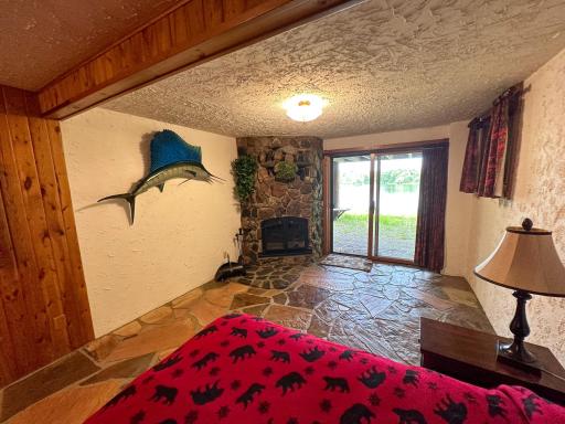 Photo for 661 Town Road 134 N, Baudette, MN 56623 - Listing #6390307 Lower Level Bedroom with walkout and fireplace