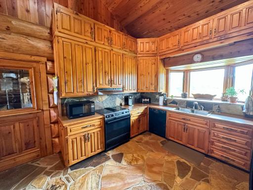Photo for 661 Town Road 134 N, Baudette, MN 56623 - Listing #6390307 Lots of cabinets in this kitchen. Plus the large window gives so much natural light.