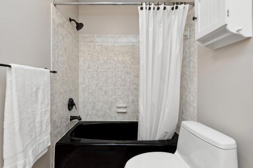 Alternate view of main level full bath - note the extra deep tub.