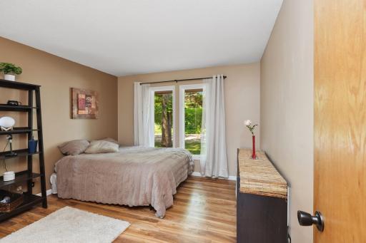 One of the two secondary bedrooms found on the main level.