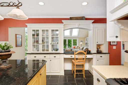 Glass cabinets and a pass through to the dinging area