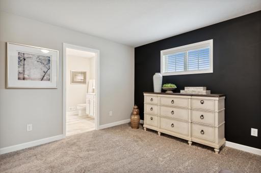 By having the walk in closet accessible from the bathroom, it leaves the room with more space for furniture placement. *Photos are of a model home, some features and colors may vary.
