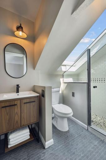 Photo for 2708 Irving Avenue S, Minneapolis, MN 55408 - Listing #6391325 Owner's Suite 3/4 bath with skylight lake view
