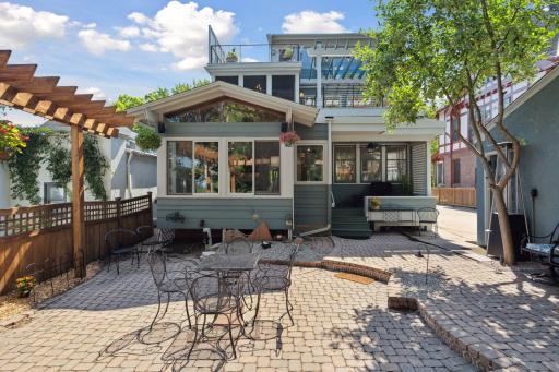 Photo for 2708 Irving Avenue S, Minneapolis, MN 55408 - Listing #6391325 Back view of home, showing windows, patios and decks