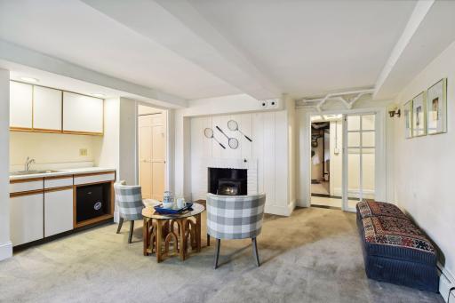 The walk-out lowest level has a kitchenette, sitting area, bath and bedroom.