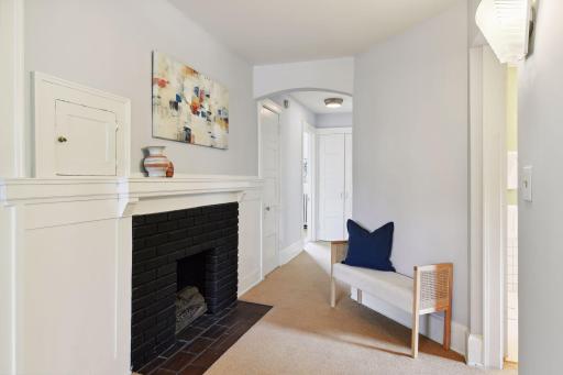 Another nod to history with the second floor hallway fireplace.