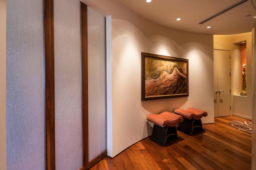 View of the closed pocket doors with frosted, etched glass if privacy is desired, to close off master from the main hallway and foyer.