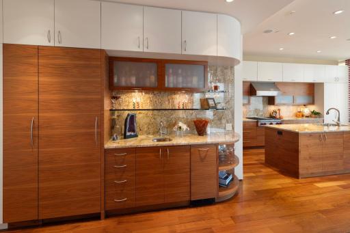Close up view of the magnificent wet bar with bar sink and icemaker.