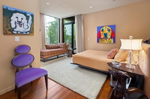 A built in bed compliments the guest room with a large patio right outside your door, accented by floor to ceiling windows and a full bathroom.
