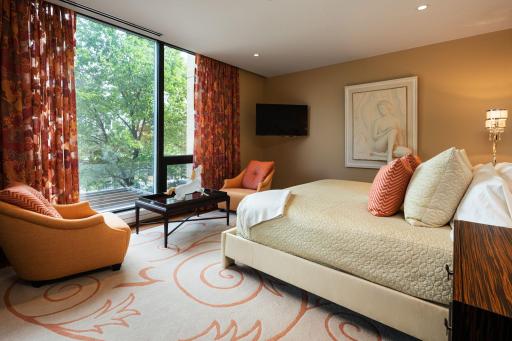 Master suite with gorgeous views from the floor to ceiling windows.