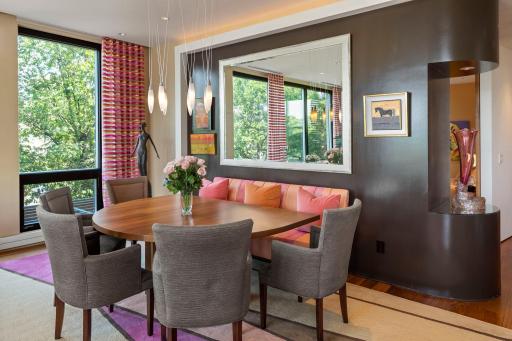 Additonal views of the dining area with lovely views and additional art nook built into the splendidly designed curved wall.