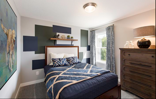 Bristol, Bedroom three on the upper level offers privacy and generous space. Previous home, finishes will vary.