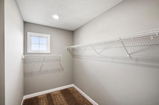 Perfectly sized owner’s suite closet! Model Floorplan. Actual home finishes will vary.