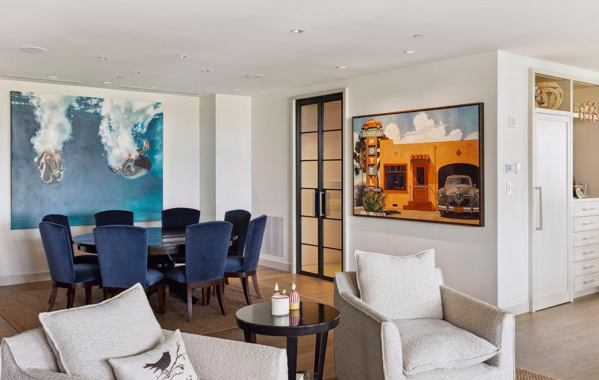 Easy to regulate Lutron lighting throughout highlights the art and dining room.