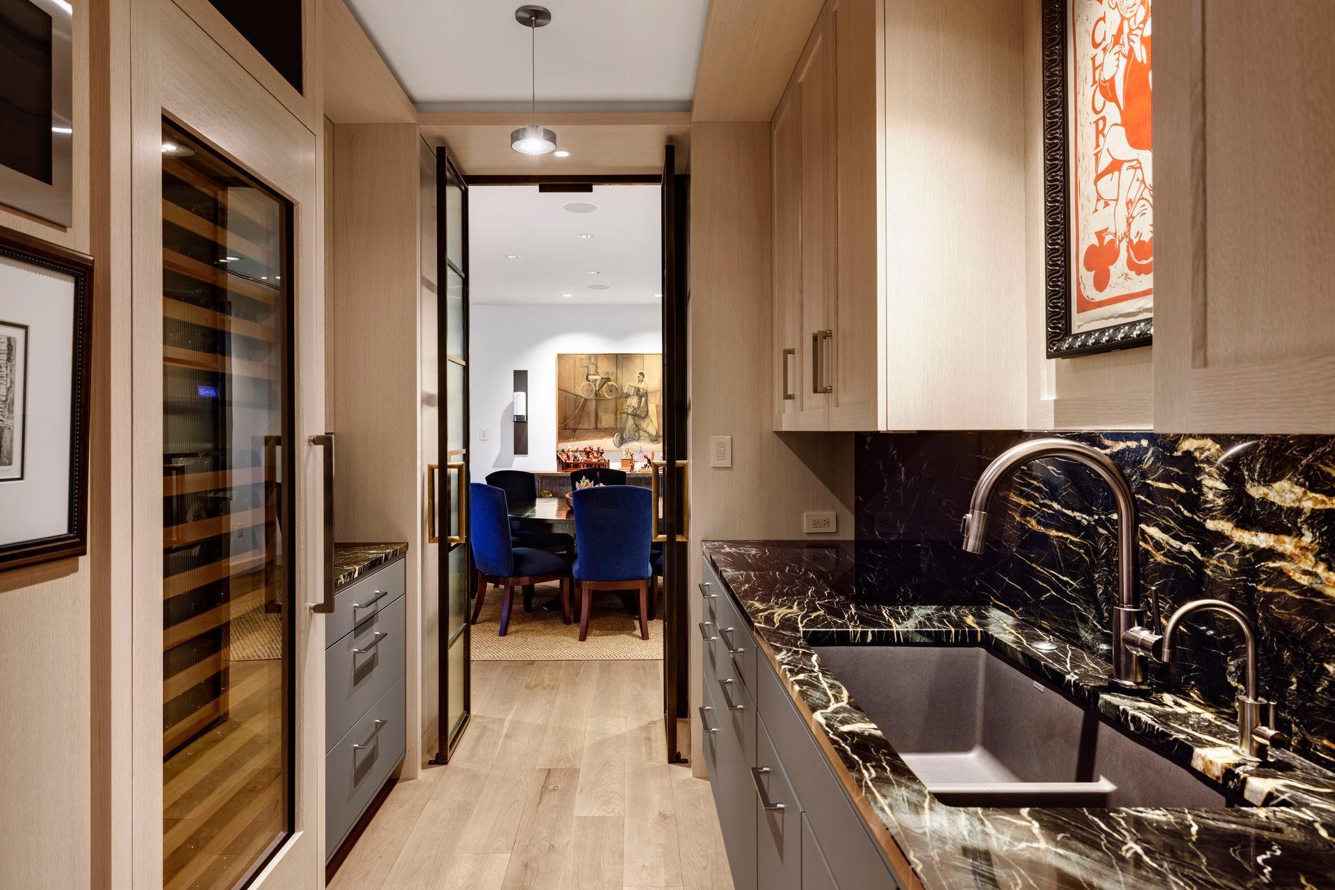 Easy access to both kitchen and dining room is the unique advantage of this special space where prepping, serving and cleaning up can be done out of guests' view.