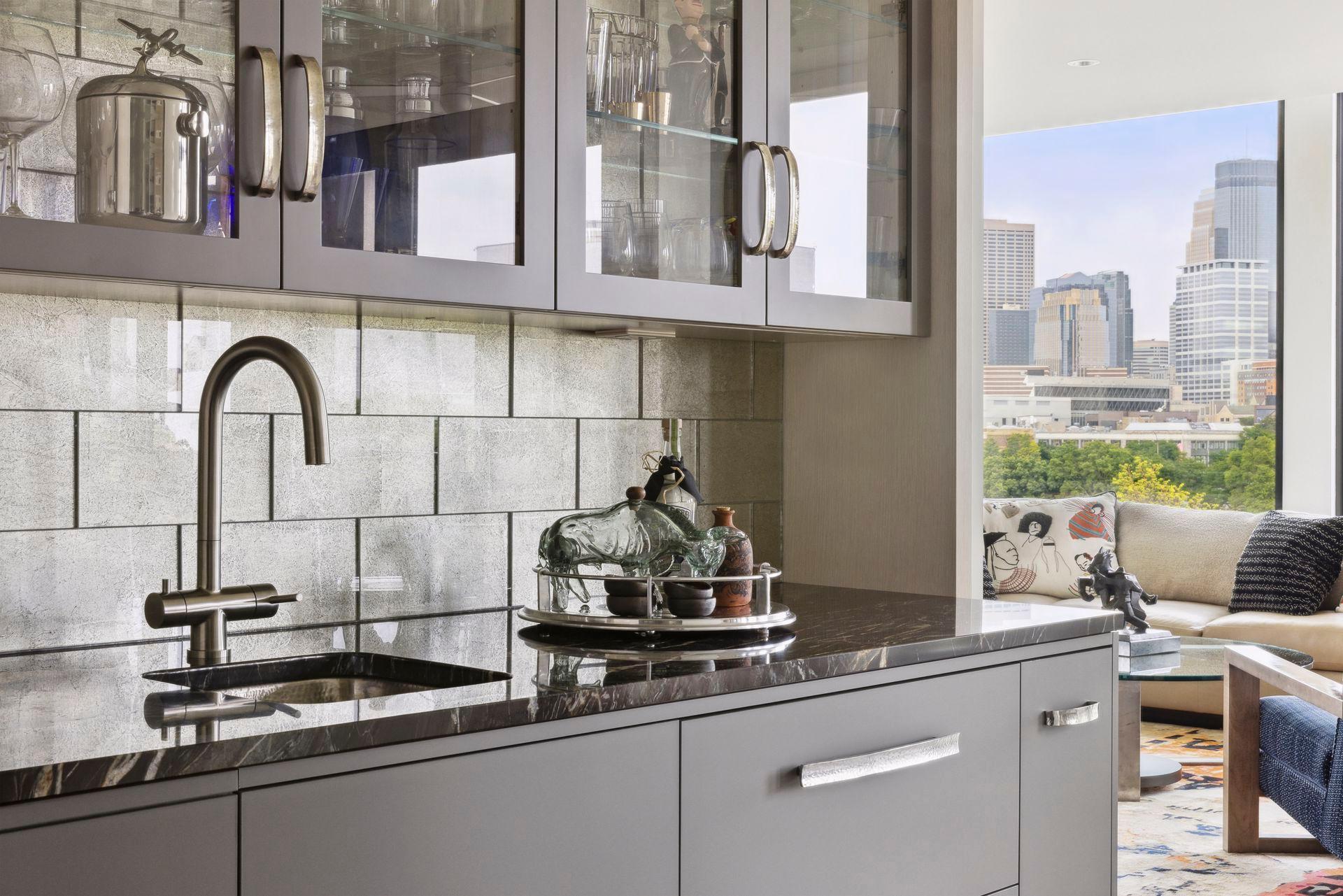 A hammered nickel sink with filtered water and cast nickel hardware highlights the quality details.