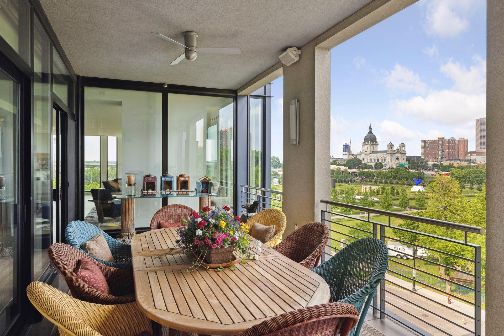 Room for a crowd in this covered porch. There are a gas grill hookup, a ceiling fan and speakers.
