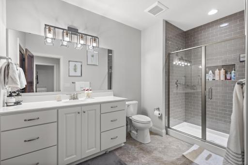 Lower level 3/4 bath with tile shower