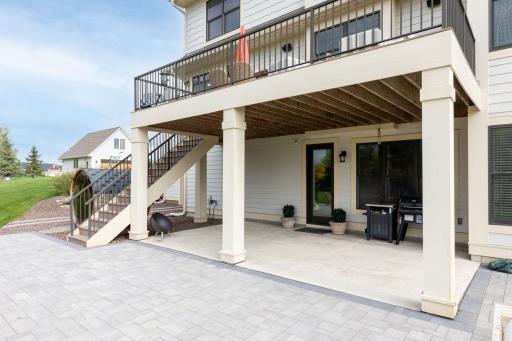 Spacious upper level deck and covered patio to enjoy the sun or shade