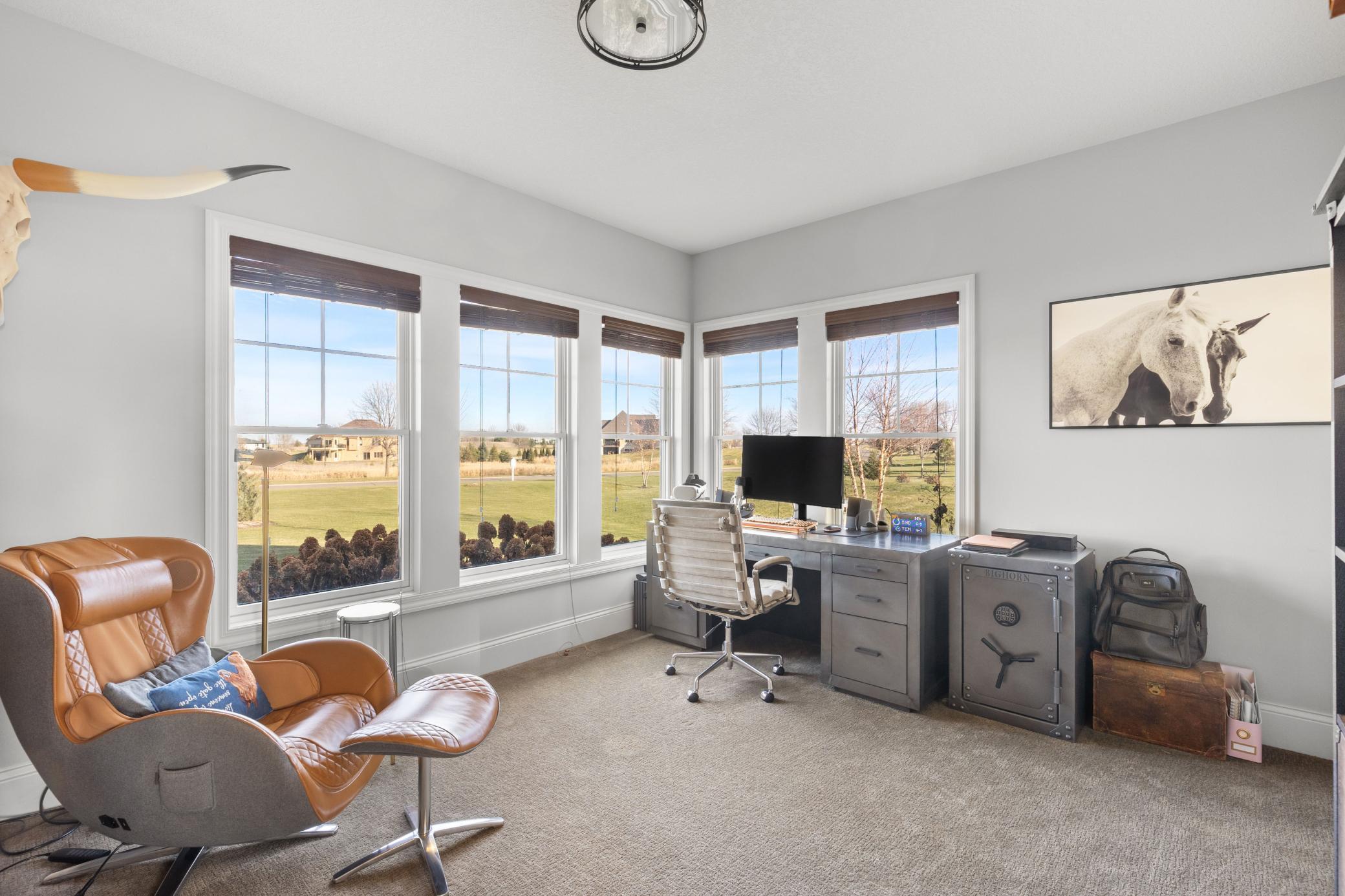 Main level office is a wonderful place to work with plenty of light & beautiful views