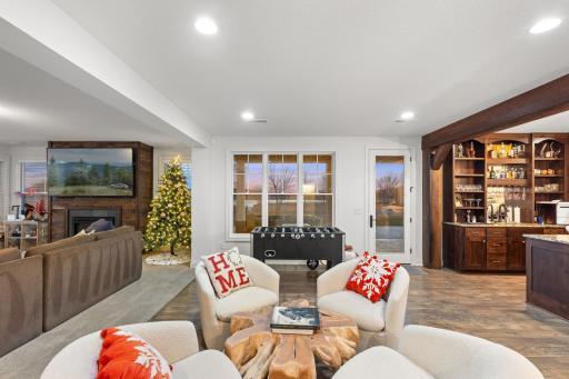 The walkout lower level is an entertainer's dream! Family room, recreation area, playroom, full bar & wine cellar, a home theater and more!