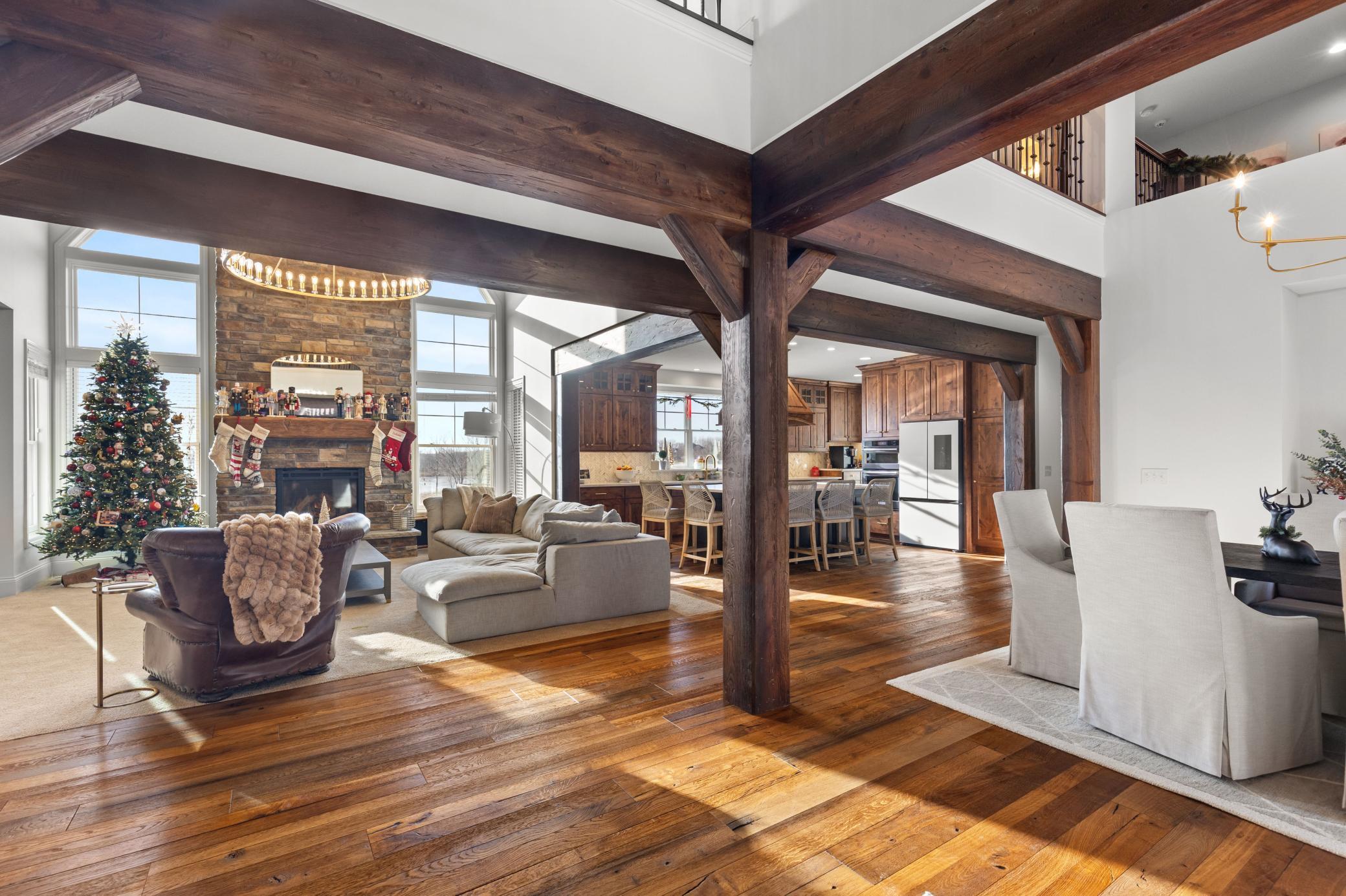 This home has been beautifully updated with fresh paint throughout that highlights the beautiful wood beams & hardwood floors