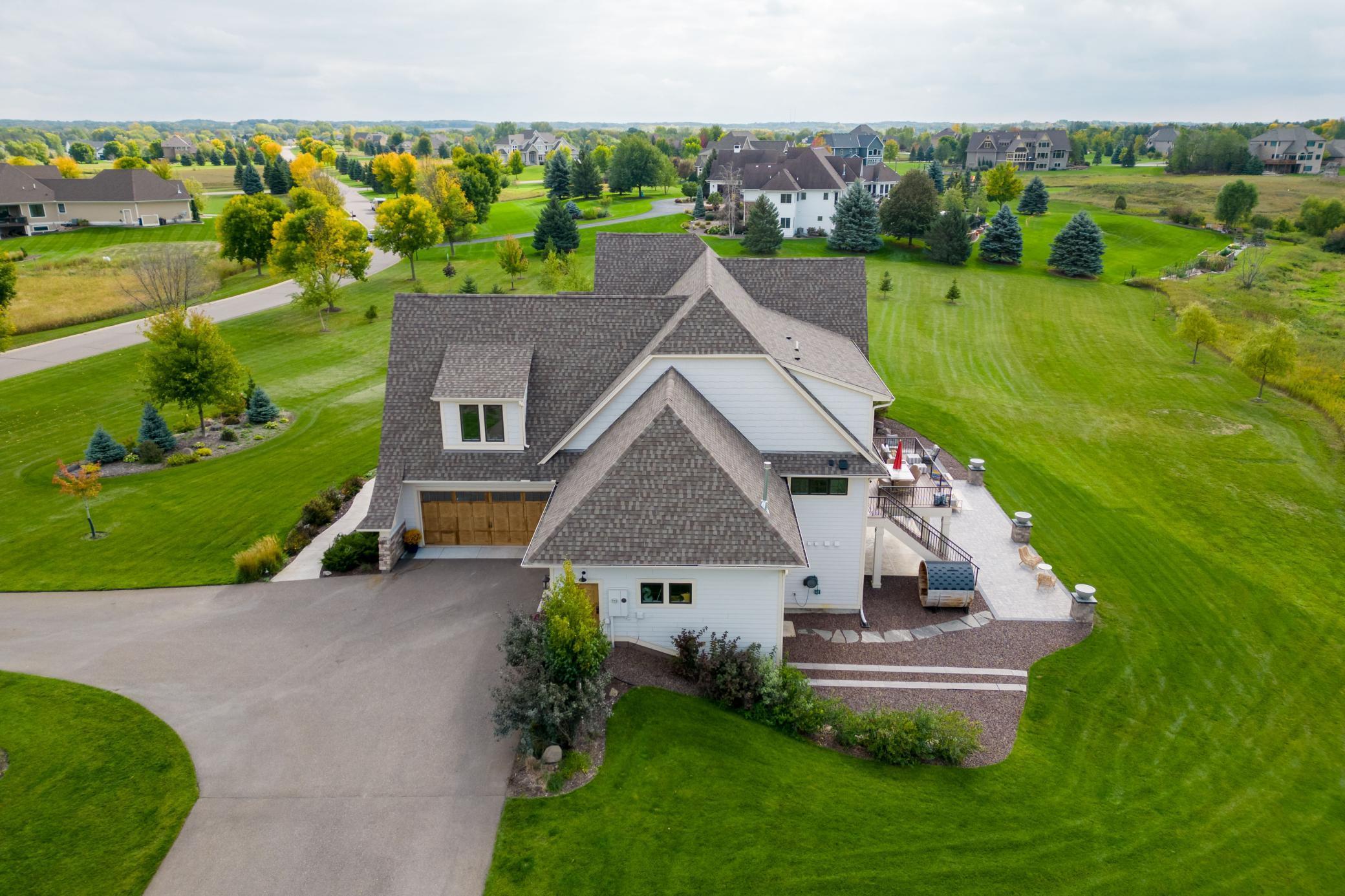 Fantastic storage space for all your vehicles & equipment in the main level 4 car garage and tuck under garage
