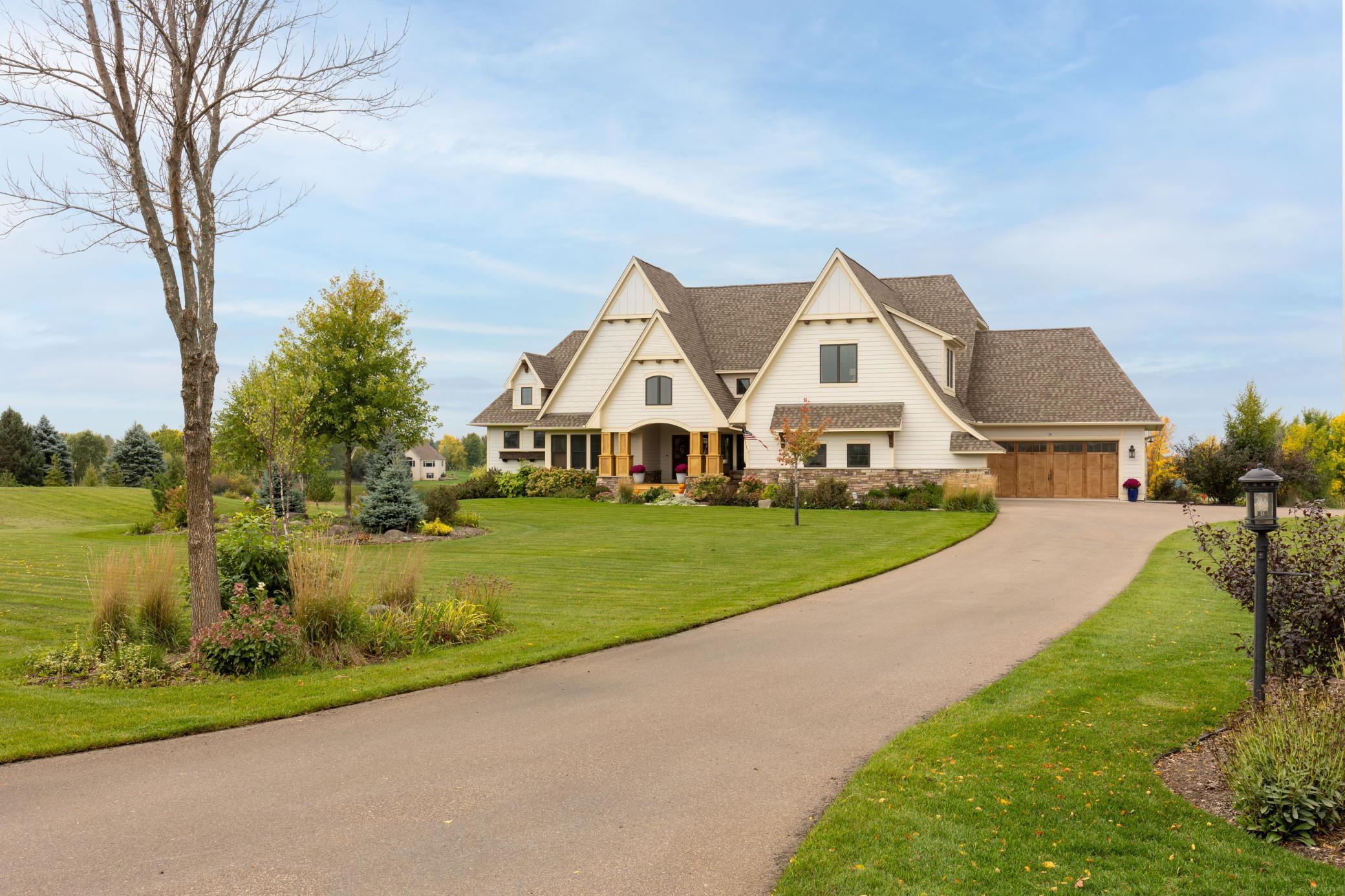This custom home sits in a beautiful 10+ acre lot on a cul-de-sac