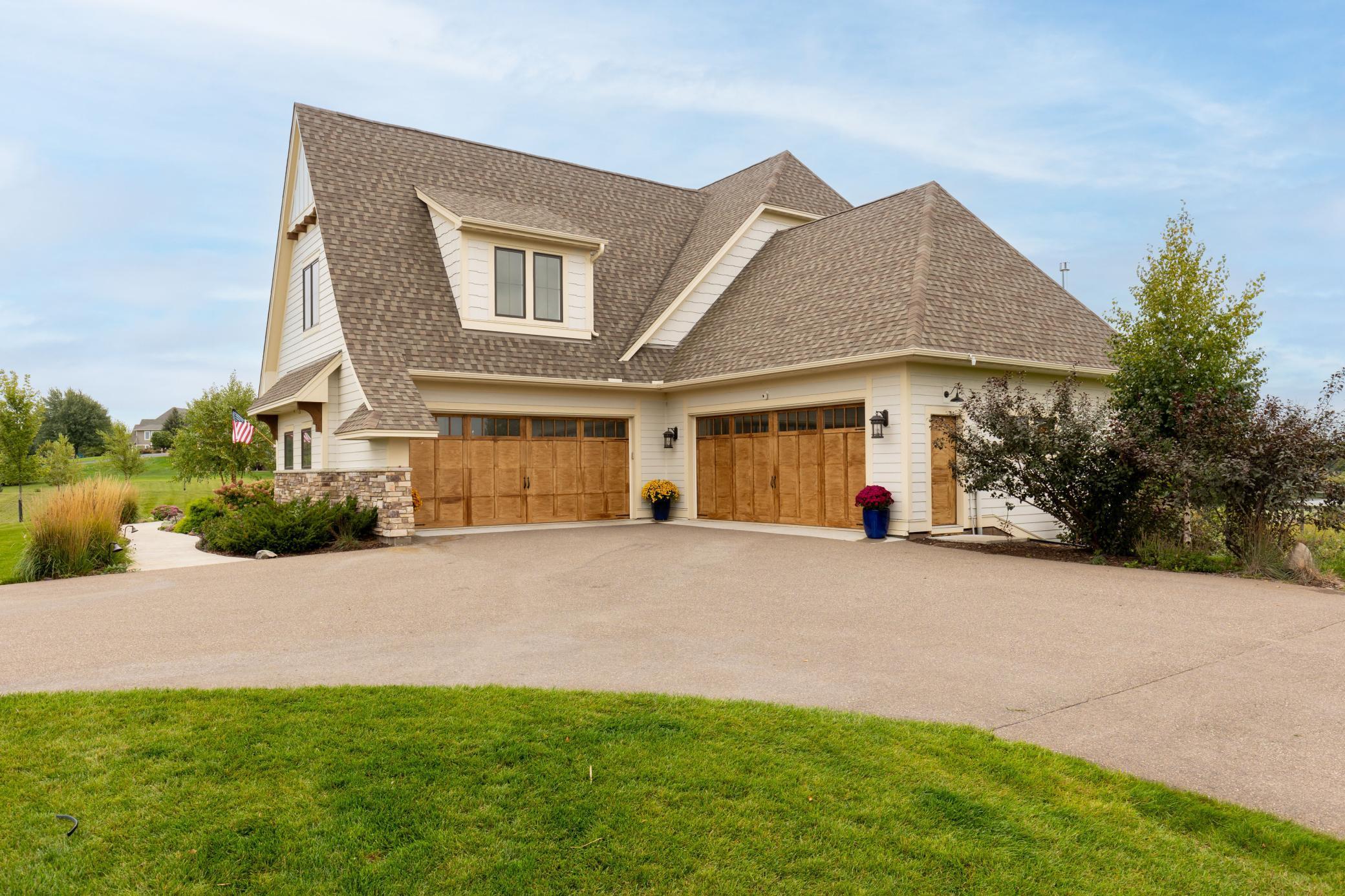 Plenty of space in the 4-stall heated garage w/epoxy floors