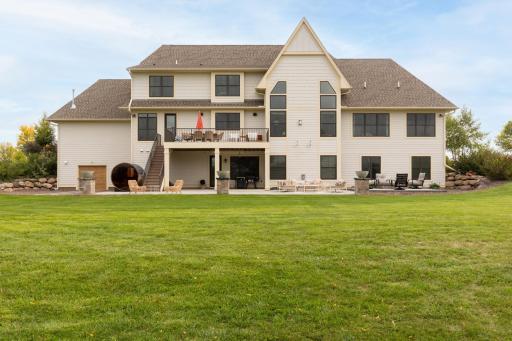 Plenty of space to entertain and enjoy the outdoors on the back deck & sprawling patio