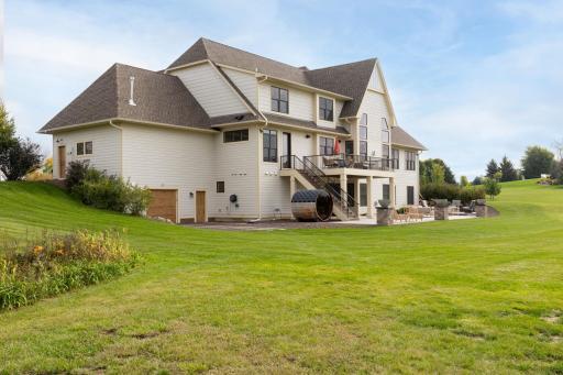 Bonus insulated & heated tuck under garage perfect for easy access to all your lawn & water equipment & outdoor furniture storage!
