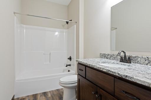 MODEL PHOTO - This home has WHITE CABS. The best finishing selections in this full bath with granite counter and custom cabinets!