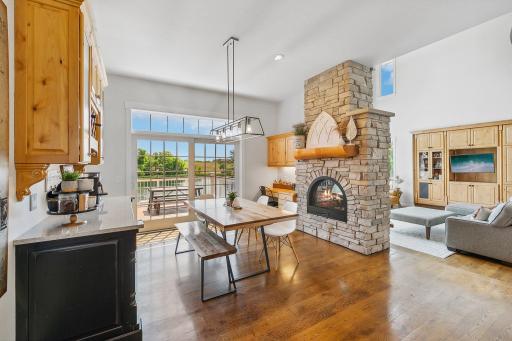 Informal Dining Room with Two Sided Stone Fireplacen