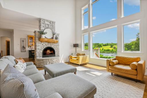 Main Floor Family Room with Soaring Windows and Stone Fireplace