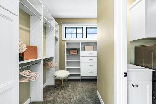Generous size walk through closet adjacent to main floor laundry.