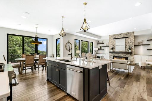 Center island Kitchen with storage on both sides, Under mount sink and work station.