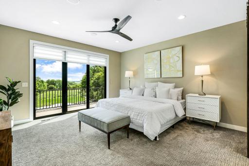 Fabulous ownerâs suite with ensuite bath, closet & main level laundry all connected with heated floors!
Panoramic views from the owners suite overlooking the pool and rolling hills. Electric blinds, and fabulous deck views for morning coffee.