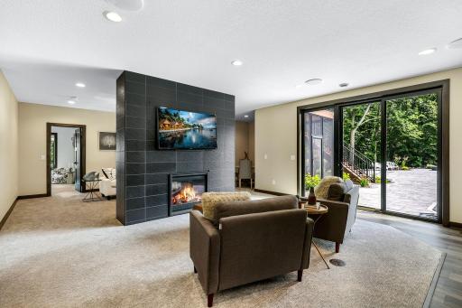 Dual sided fireplace with tv mounts on both sides. Hidden space in fireplace for all gaming components.