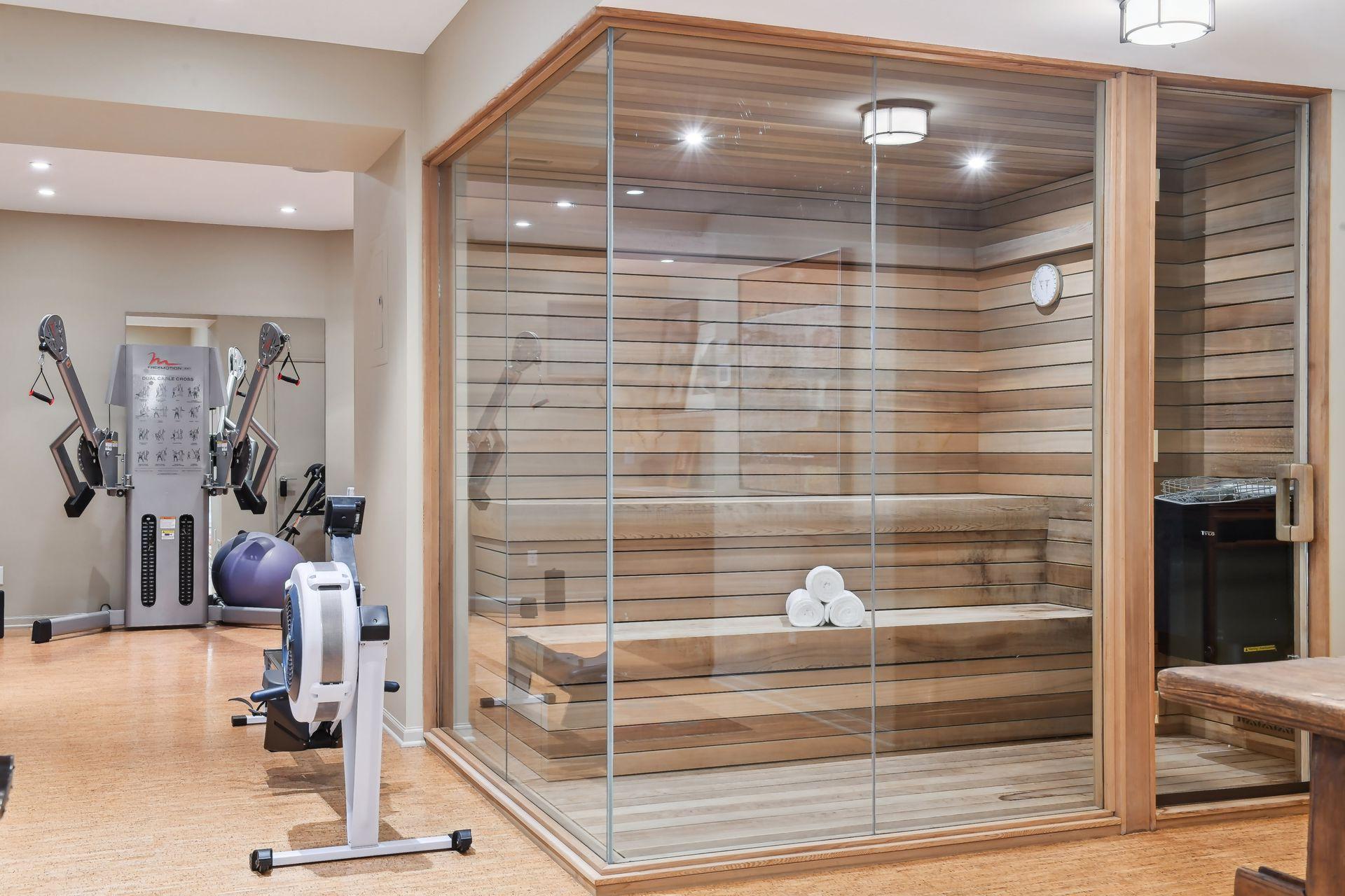 Who needs a gym membership when you have the convenience of a home gym and sauna.