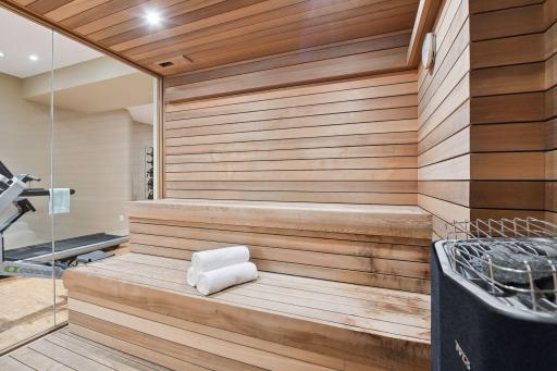 The sauna provides a relaxing home spa experience.