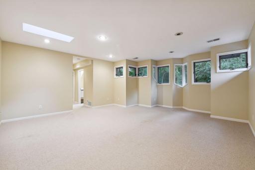 The private guest/nanny quarters on the upper level includes two bedrooms, a living room, kitchenette and a three-quarter bathroom.