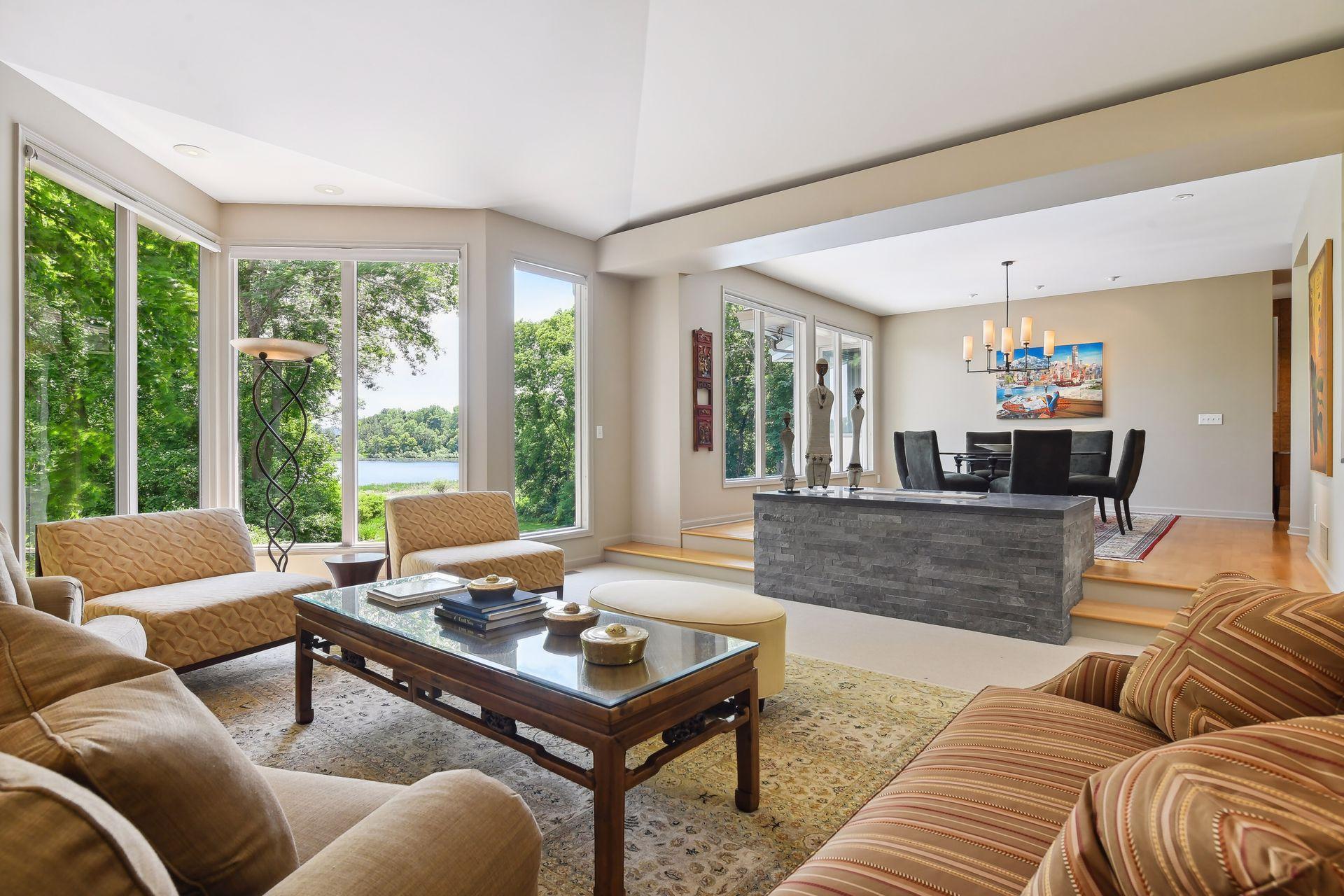 Wall of windows provides a remarkable first impression showcasing grand views to the private backyard.