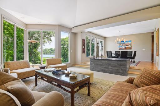 Wall of windows provides a remarkable first impression showcasing grand views to the private backyard.