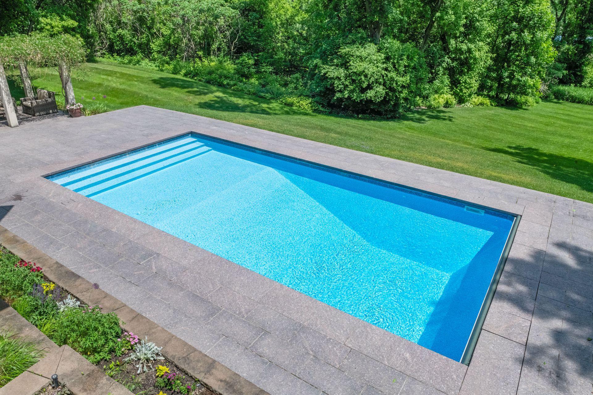 The temperatures are warming and the pool looks refreshing.