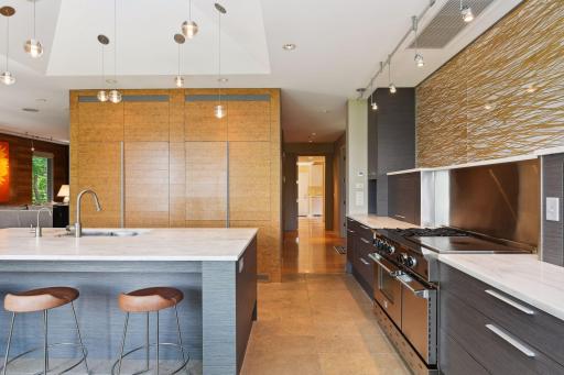 The bamboo paneled fridge and freezer adds a special touch.
