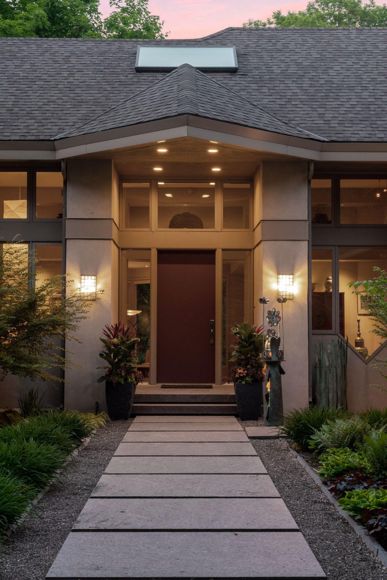 The front door opens to reveal a spacious foyer.