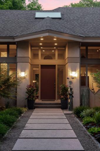 The front door opens to reveal a spacious foyer.