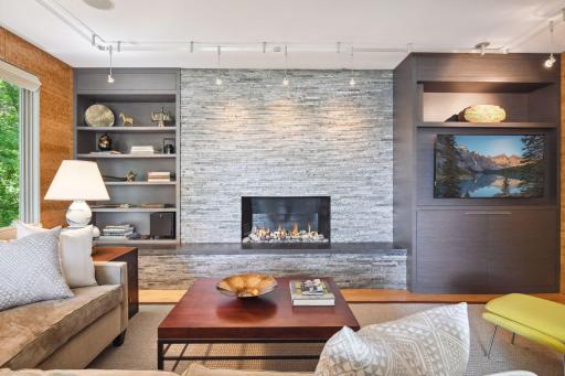 The gorgeous stacked stone gas fireplace provides ample warmth on cool evenings.