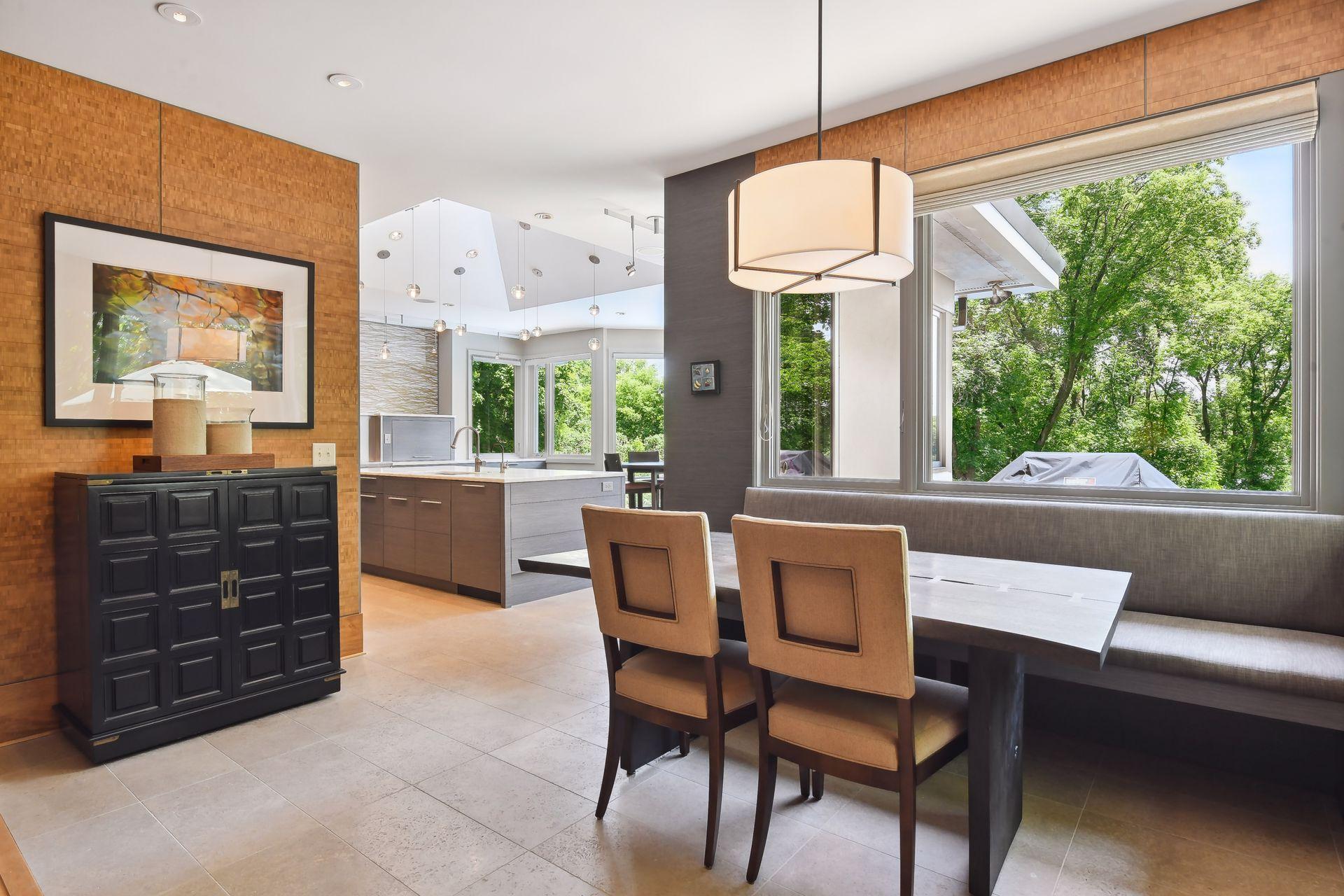 One of many dining areas throughout the home, both inside and outside.