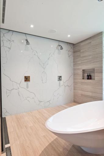 The tile work in this stunning wet room is something to be admired.